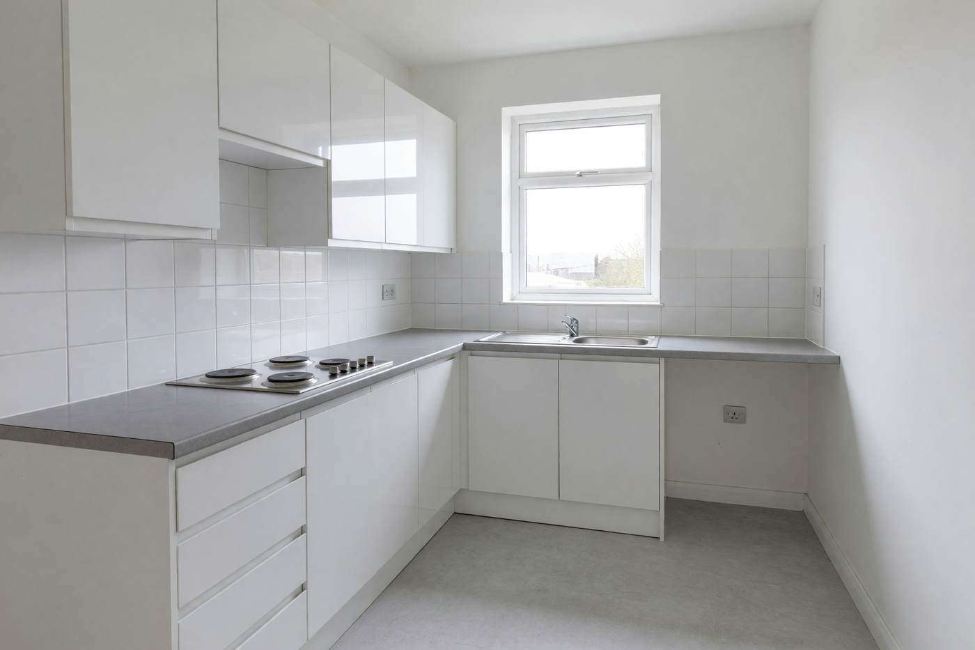 The same kitchen after an end of tenancy clean, ready for the check-out